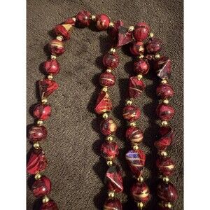 Deep red with gold beaded necklace 24"